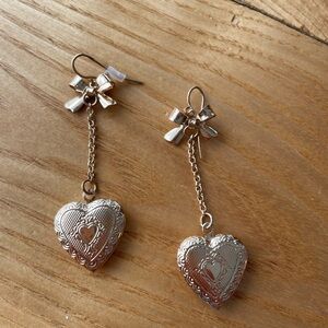 Silver Heart Dangle Earrings with Bow Accent - Women’s Jewelry
3/16$